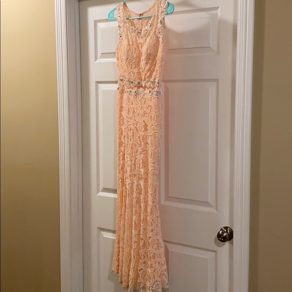 Stunning prom dress. A very light coral color.